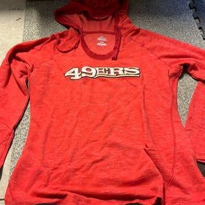 Woman’s long sleeve 49ers shirt with hood.